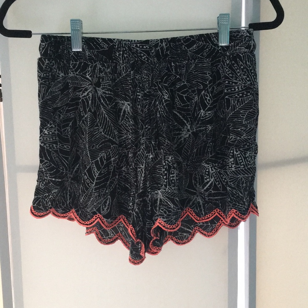 Black and white shorts with neon pink